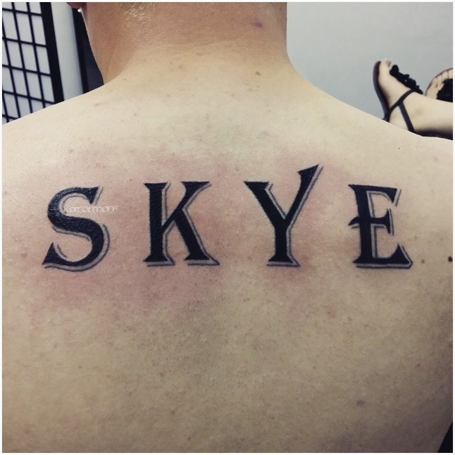 Skye name shoulder tattoo